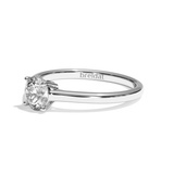 Bague solitaire diamant rond or blanc - Précieuse