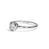 Bague solitaire diamant rond or blanc - Élégante